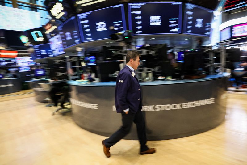 Wall Street gives up gains, investors book profits